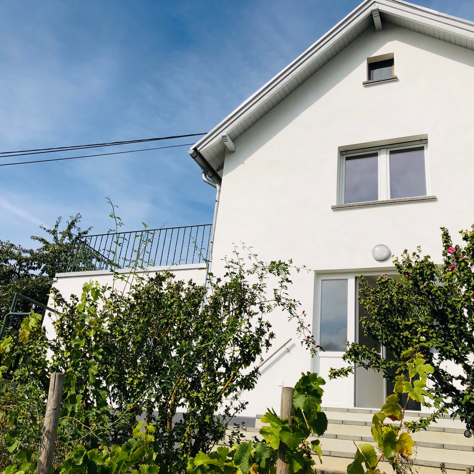 Errichtung eines Wintergartens und eines Balkons